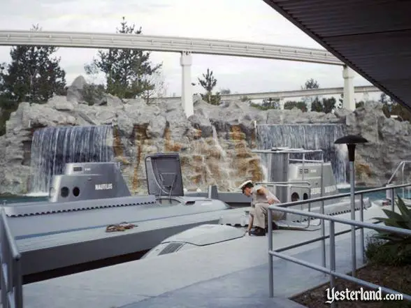 Photograph of the Submarine Voyage cast member opening the hatch