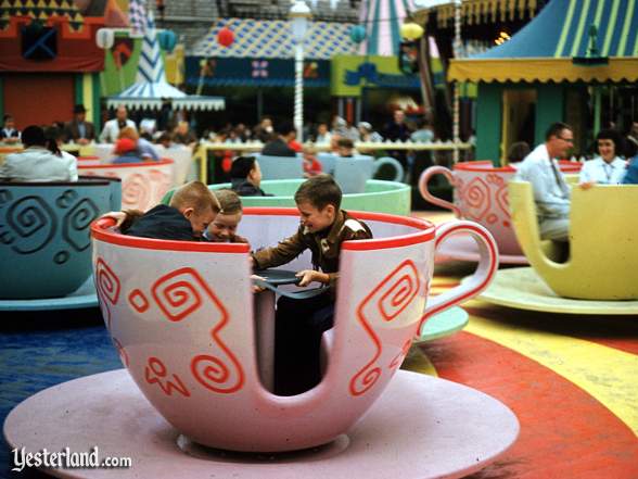 Photo of Mad Tea Party with children spinning a pink cup