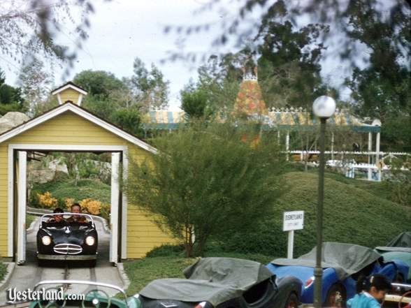 Photo of Fantasyland Depot behind the Midget Autopia