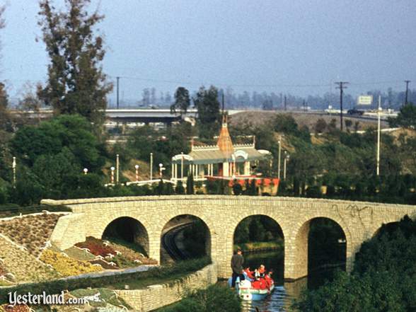 Photo of Fantasyland Depot behind Storybookland Canal Boats